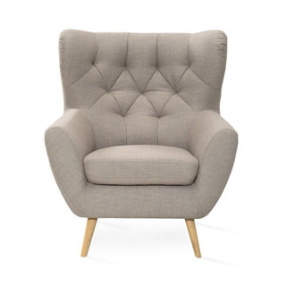 Fotel uszak VOSS pikowany na drewnianych nóżkach