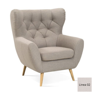 Fotel uszak VOSS pikowany na drewnianych nóżkach