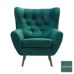 Fotel uszak VOSS pikowany na drewnianych nóżkach