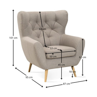 Fotel uszak VOSS pikowany na drewnianych nóżkach